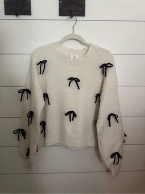 Cream Crewneck Sweater with Black Bow Trim